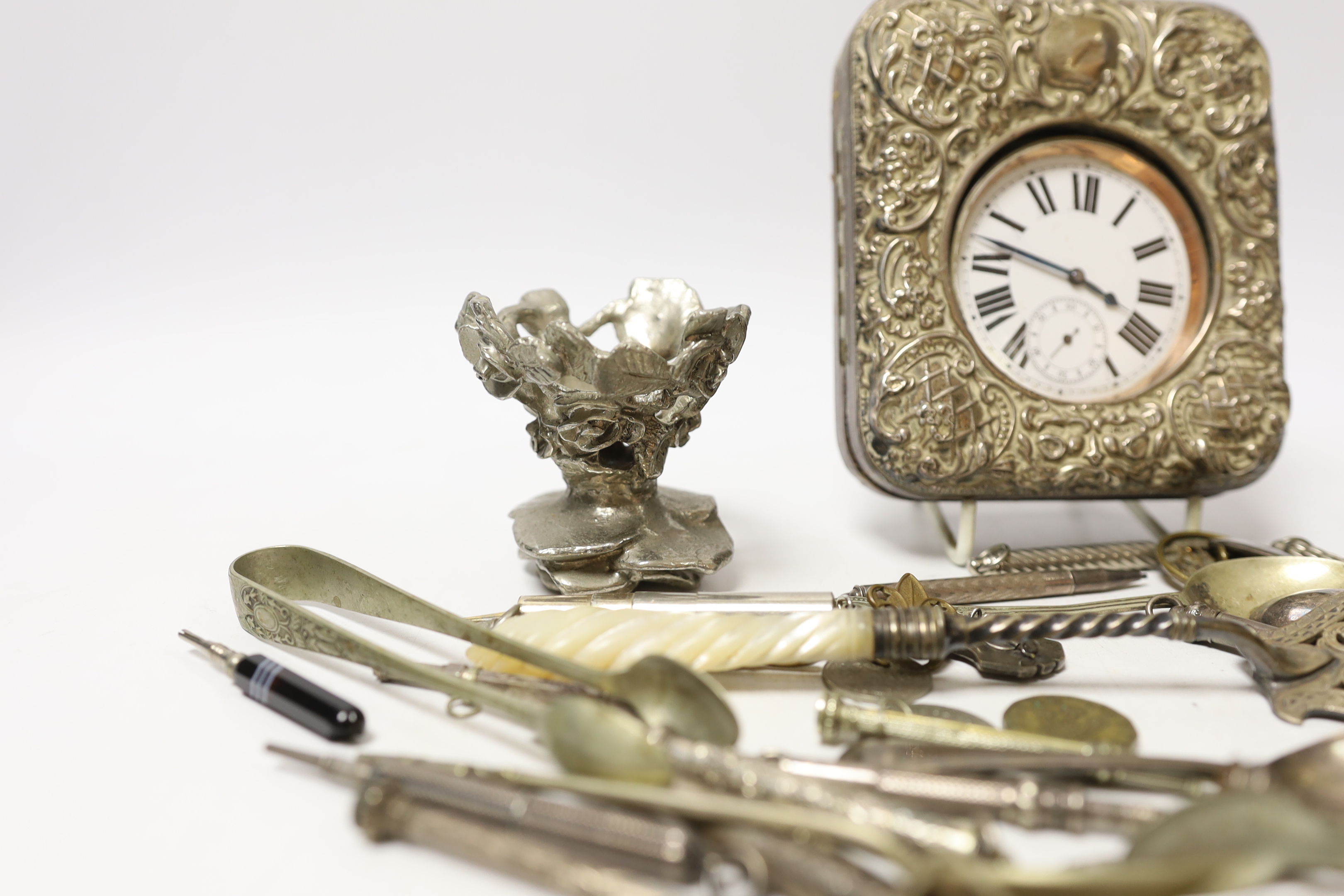 An Edwardian silver mounted travelling watch case, Birmingham, 1903, 11.4cm, and other items including plated flatware, coins and a group of propelling pencils including Sampson Mordan & Co, etc.